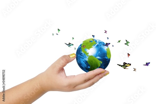 Globe on her hand isolated