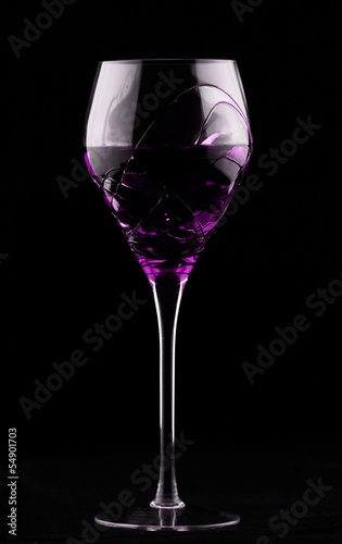 Wine glass with magenta potion