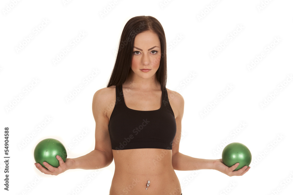 serious holding green weight balls serious holding green weight balls