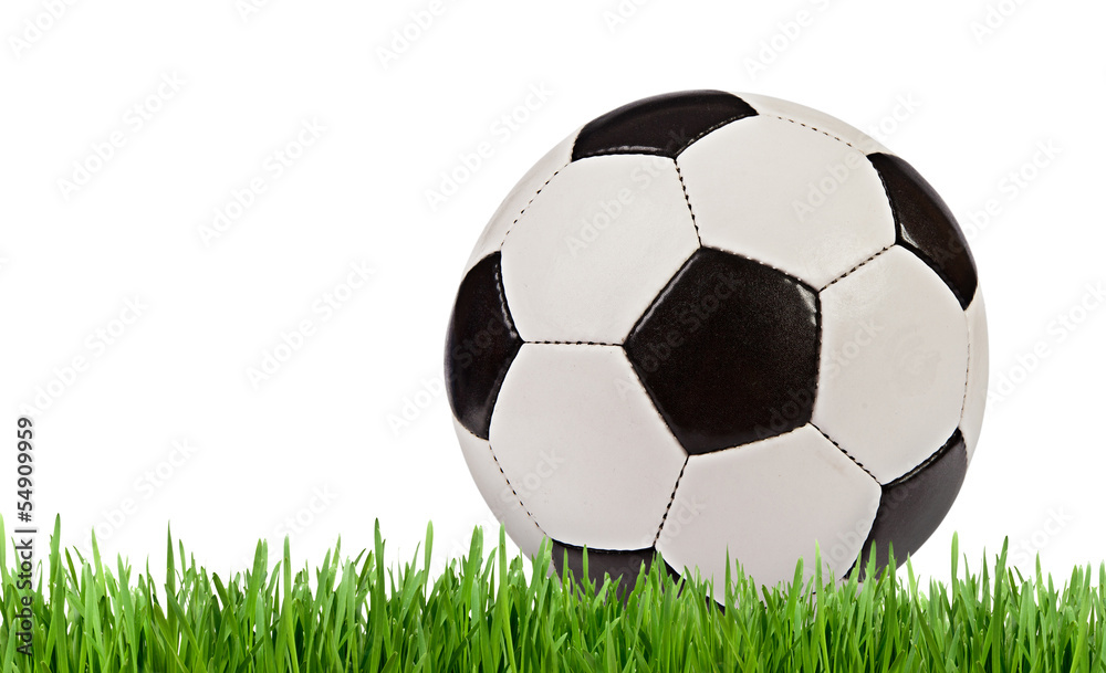 Soccer ball in the grass isolated on white background