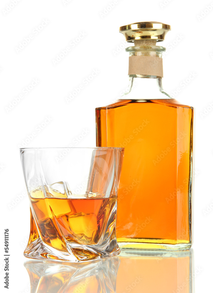 Glass of whiskey with bottle, isolated on white Glass of whiskey with bottle, isolated on white