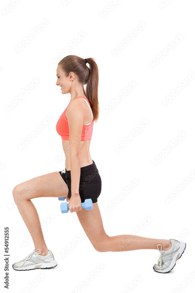 attraktive sportliche junge frau macht fittness sport isoliert attraktive sportliche junge frau macht fittness sport isoliert