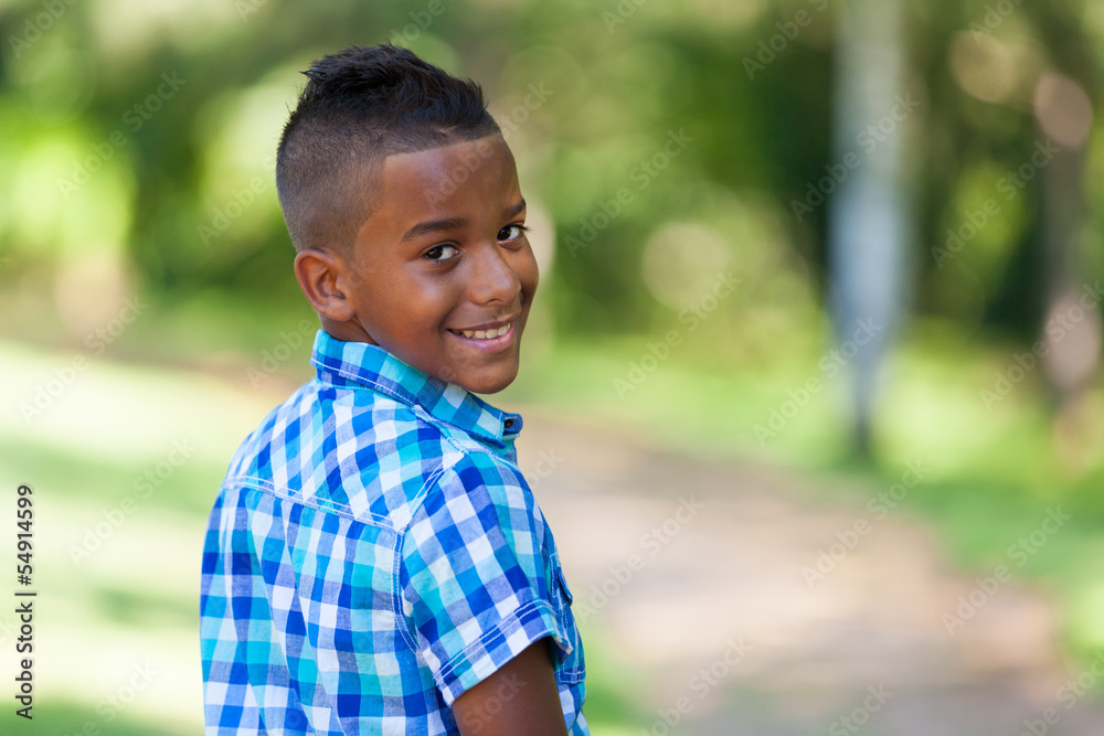 Outdoor portrait of a cute teenage black boy - African people Outdoor portrait of a cute teenage black boy - African people