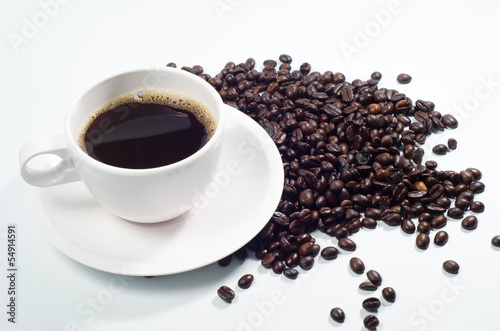 Cup of coffee with bean on white background