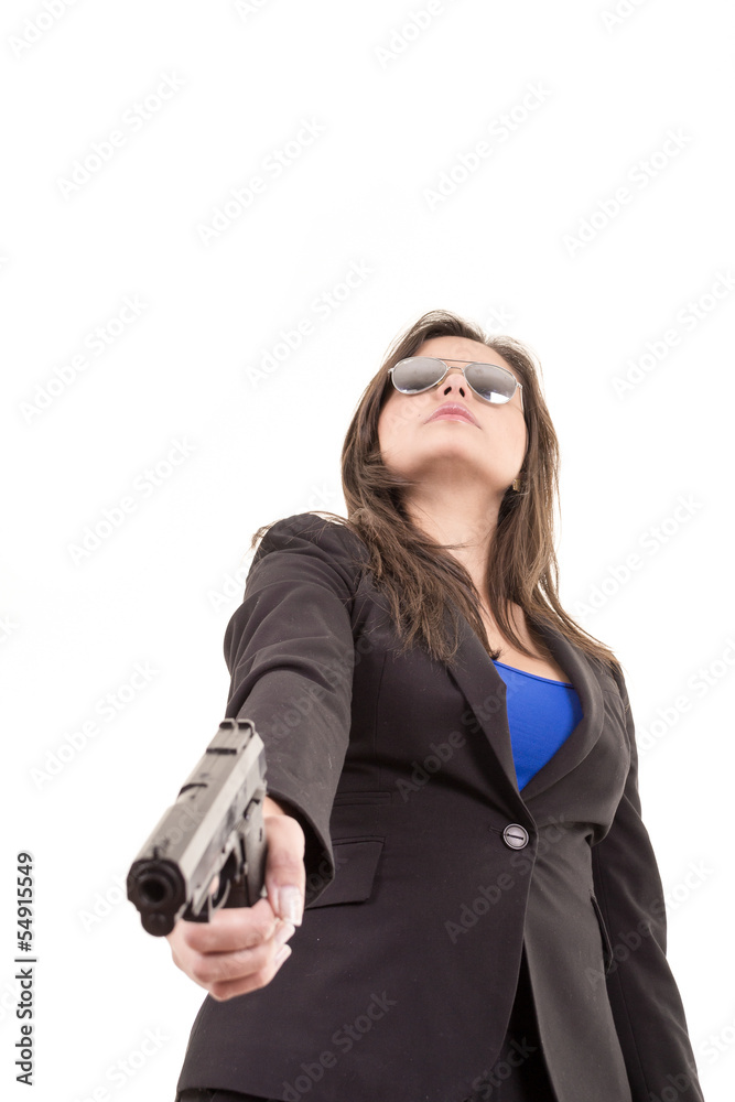 woman in suit and sunglasses holding a gun woman in suit and sunglasses holding a gun
