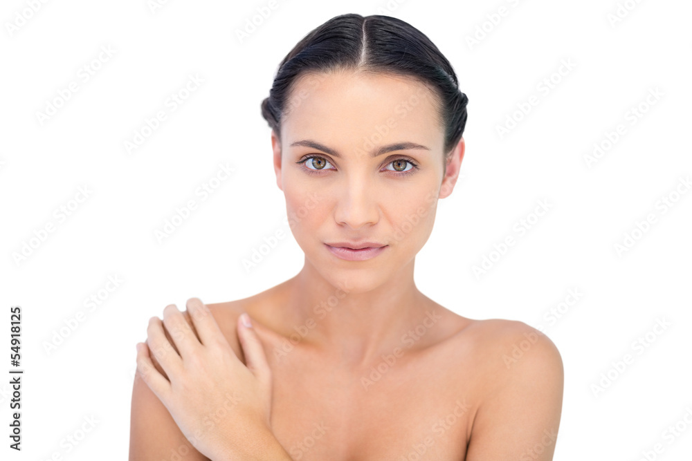 Confident young model posing looking at camera Confident young model posing looking at camera