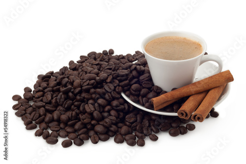 Cup of coffee and beans with cinnamon on white background