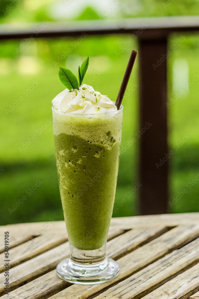 ice Green tea with a straw isolated on white background ice Green tea with a straw isolated on white background