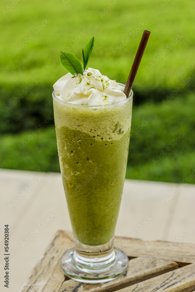 ice Green tea with a straw isolated on white background ice Green tea with a straw isolated on white background