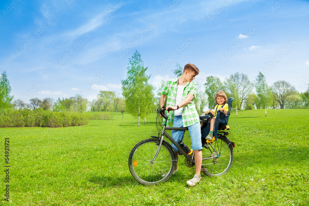 Man with child on the bike Man with child on the bike