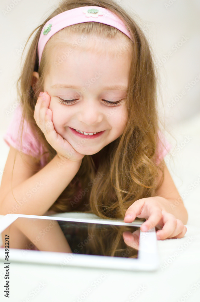 child with tablet computer child with tablet computer
