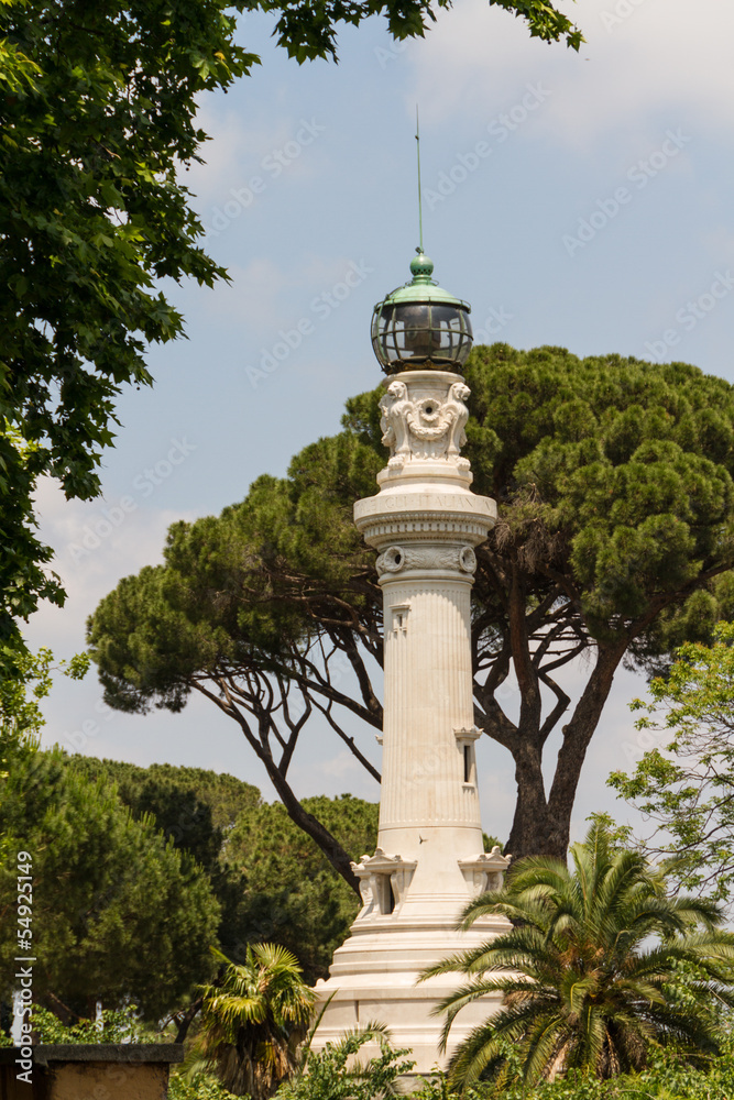 small lighthouse between the trees in Rome, Italy
