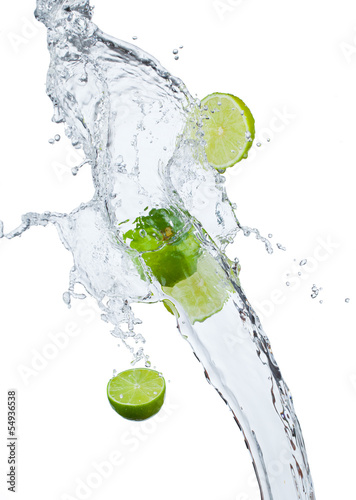 Fresh lime  falling in water splash, isolated on white backgro