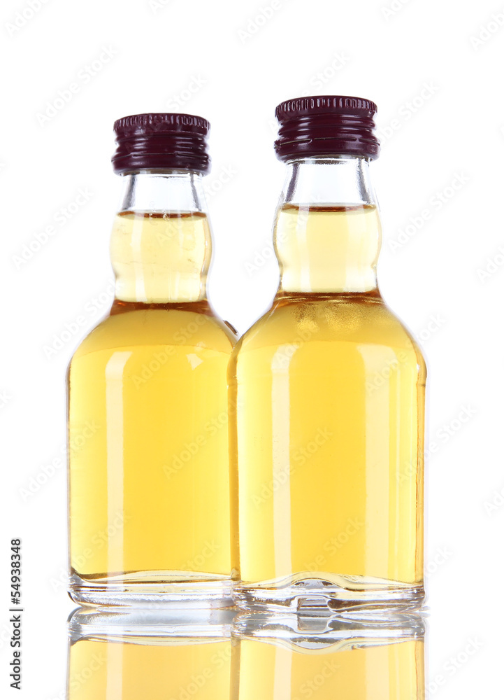 Minibar bottles, isolated on white Minibar bottles, isolated on white