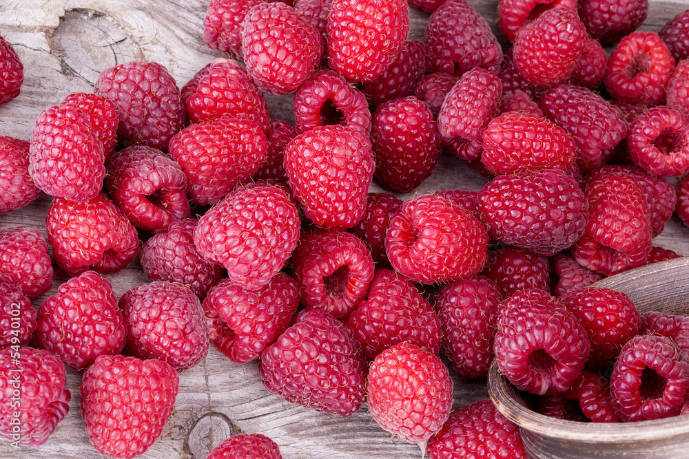 Sweet raspberry on wooden table Sweet raspberry on wooden table