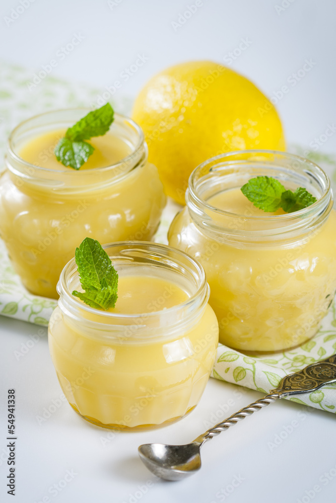 Homemade lemon curd with fresh lemons Homemade lemon curd with fresh lemons
