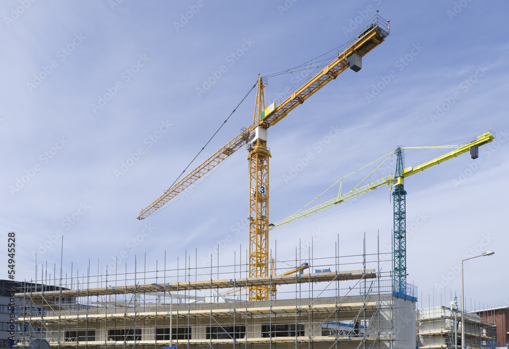 cranes on construction site cranes on construction site