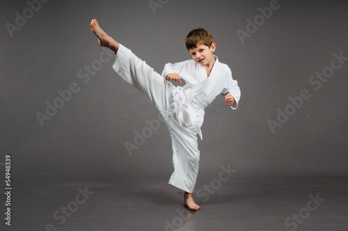 Karate boy in white kimono