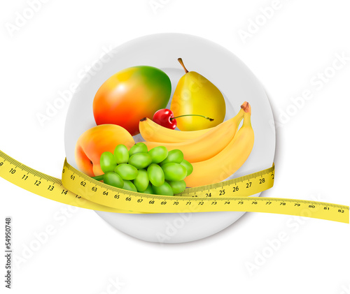 Diet meal. Fruit in a plate with measuring tape. Concept of diet