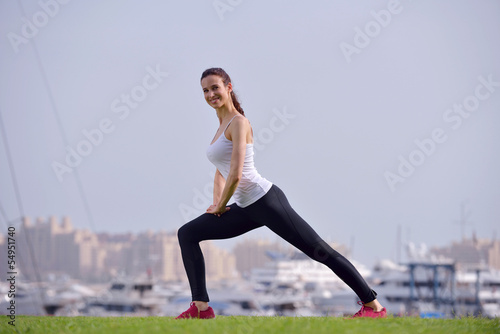 Young beautiful woman jogging on morning