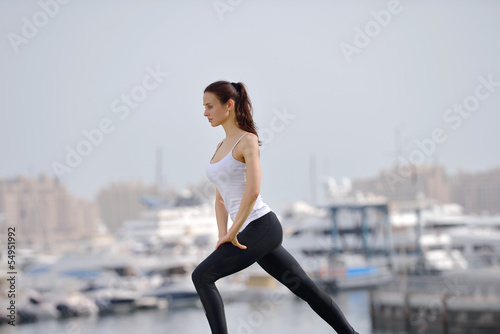 Young beautiful woman jogging on morning