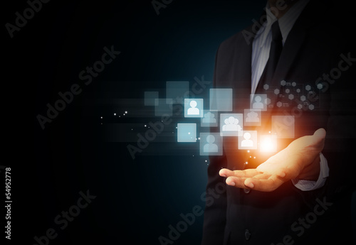 Male hand holding virtual icon of social media