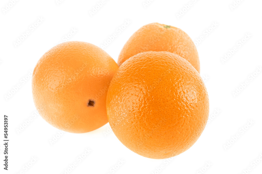 Several fresh oranges isolated on a white background. Several fresh oranges isolated on a white background.