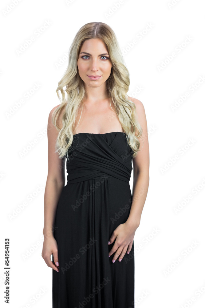 Attractive blonde with black cocktail dress posing