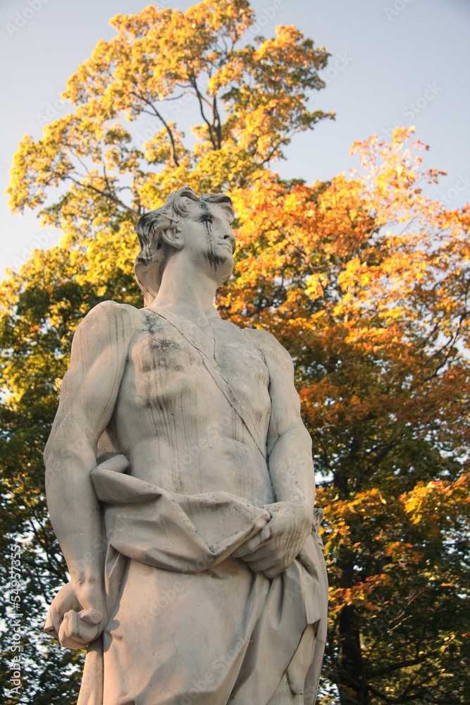 Statue in autumn park Statue in autumn park