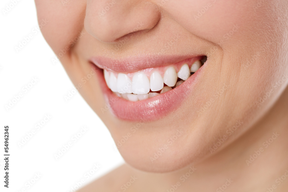 Fototapeta premium Perfect smile of young woman after teeth whitening, isolated