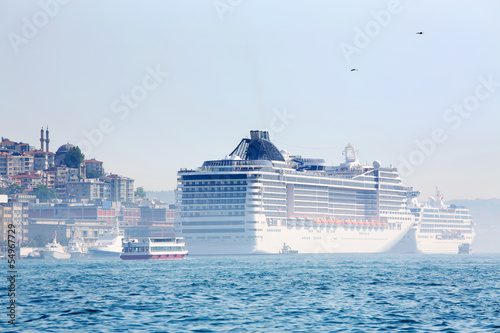 Canvas Print White big passenger liners in harbor at sunny summer day
