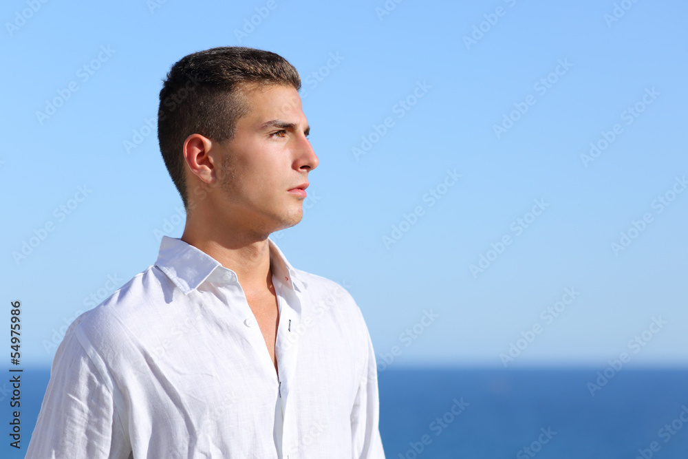 Handsome man looking at the horizon Handsome man looking at the horizon