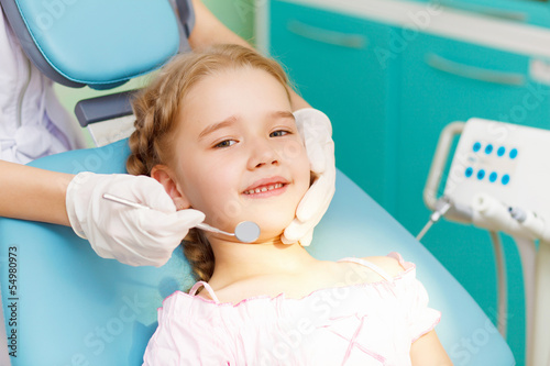 Little girl visiting dentist #54980973