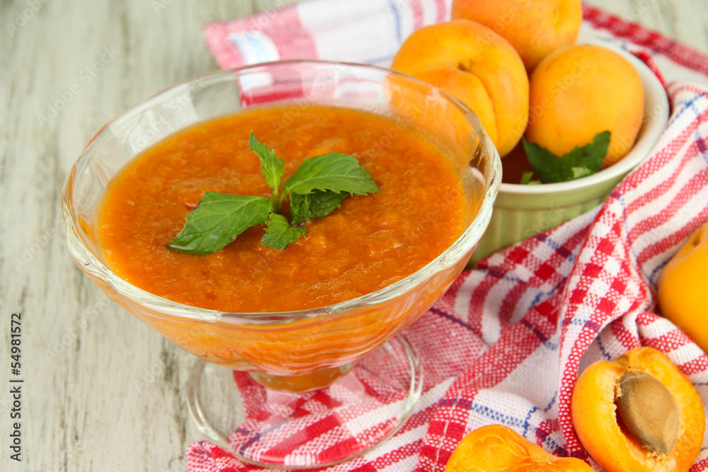 Apricot jam in glass bowl and fresh apricots, Apricot jam in glass bowl and fresh apricots,