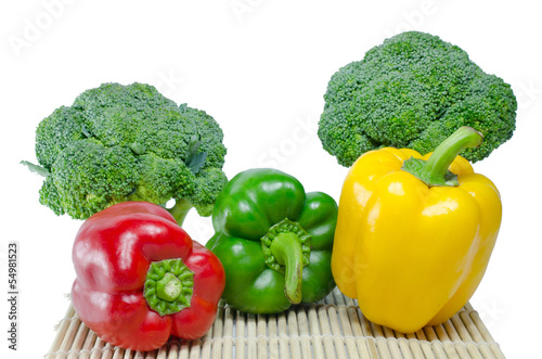 Colored paprika (pepper) and Broccoli on a white background