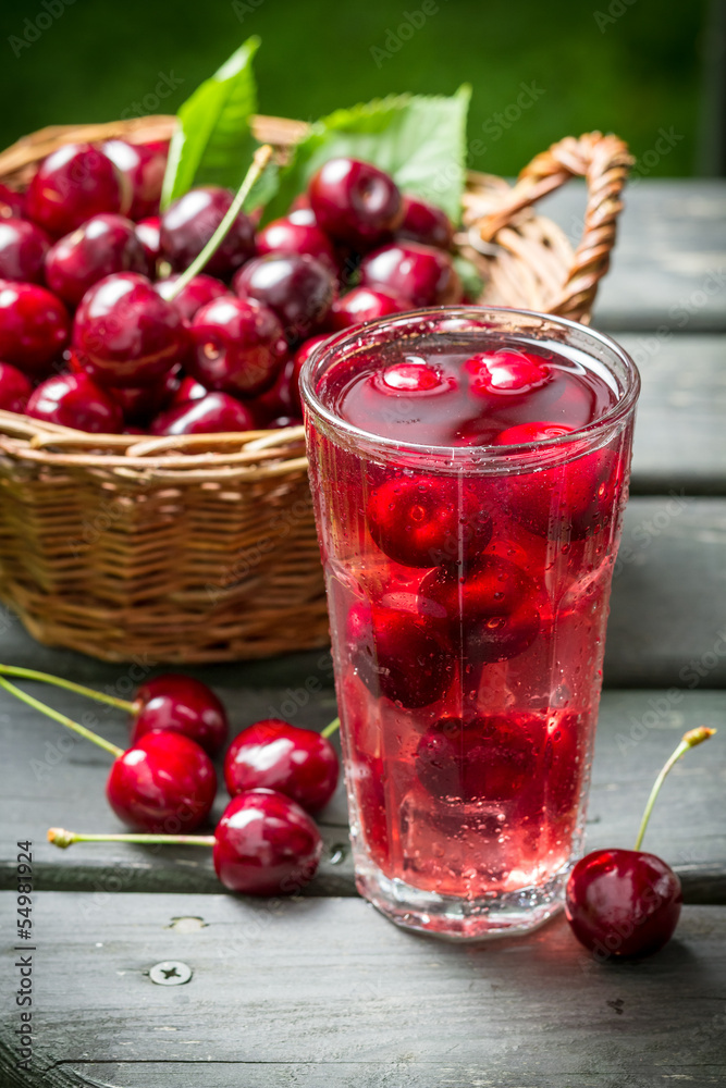Fresh juice made of sweet cherries and ice