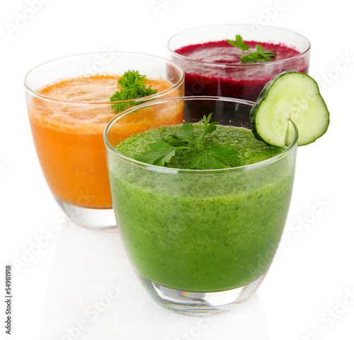 Fresh vegetable juices isolated on white