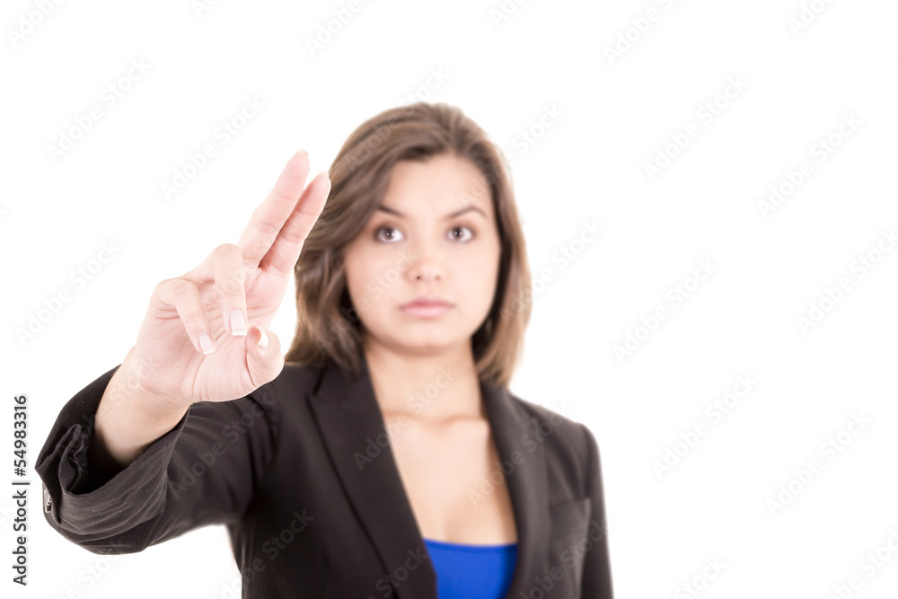 Pretty woman pointing at something in the air, copyspace Pretty woman pointing at something in the air, copyspace