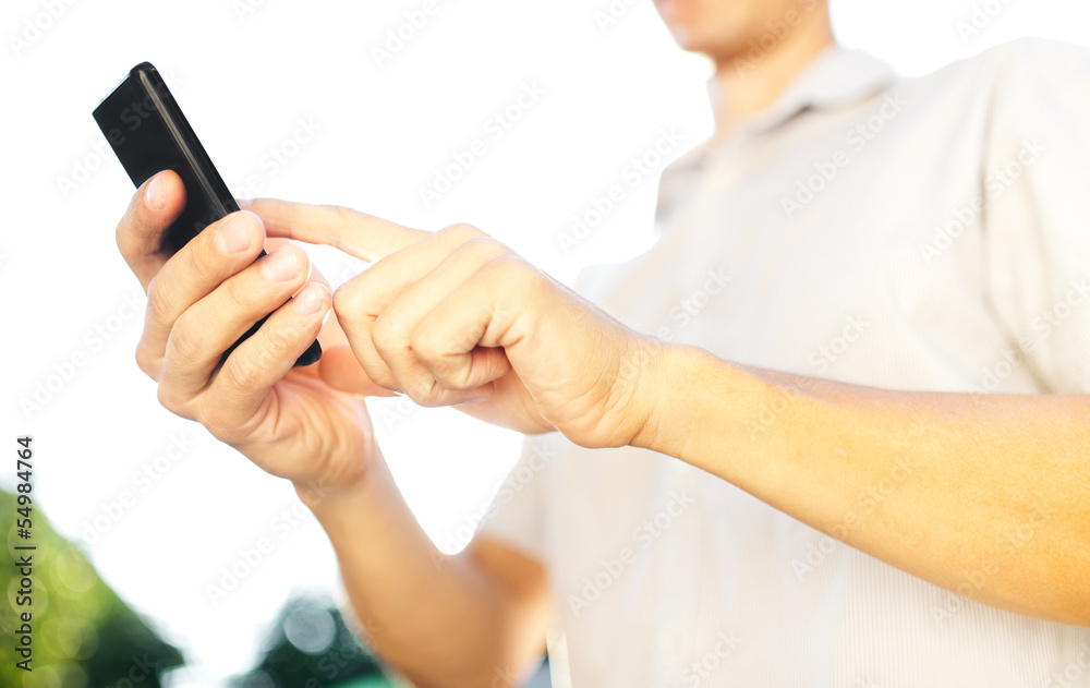 Close up of a man using mobile smart phone Close up of a man using mobile smart phone