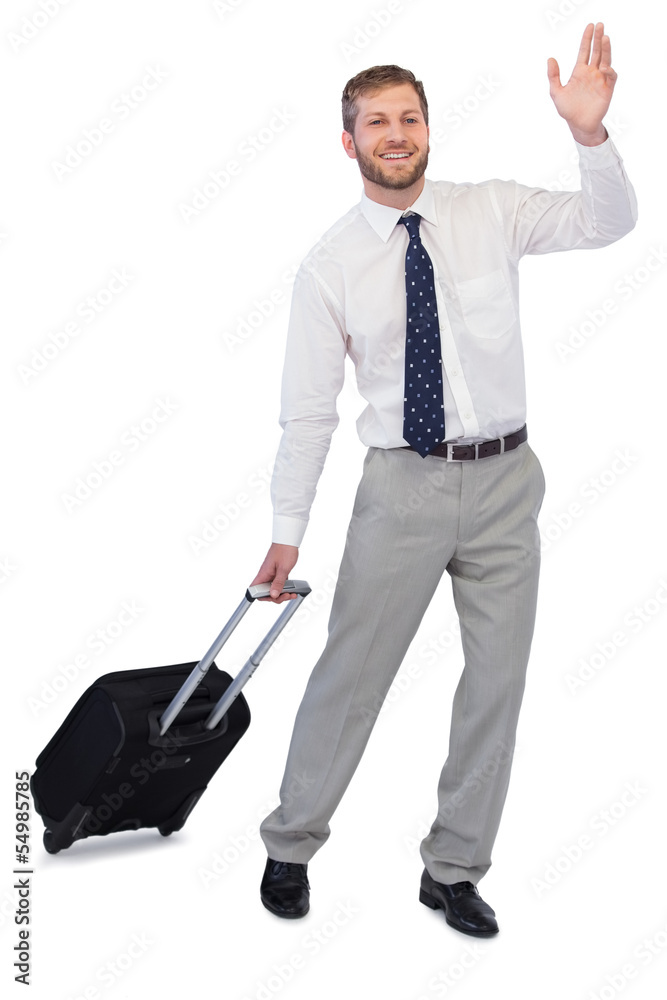 Handsome businessman with suitcase waving Handsome businessman with suitcase waving