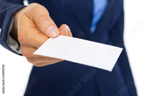Closeup on business woman giving business card