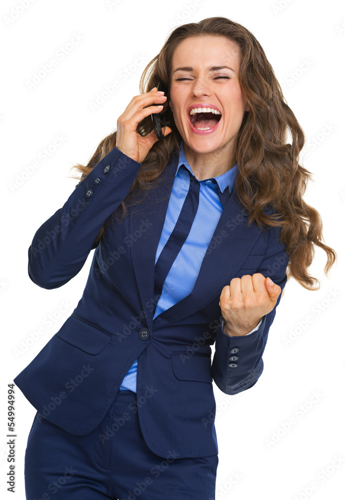 Happy business woman talking cell phone and rejoicing Happy business woman talking cell phone and rejoicing