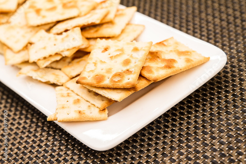 Crackers on a plate.