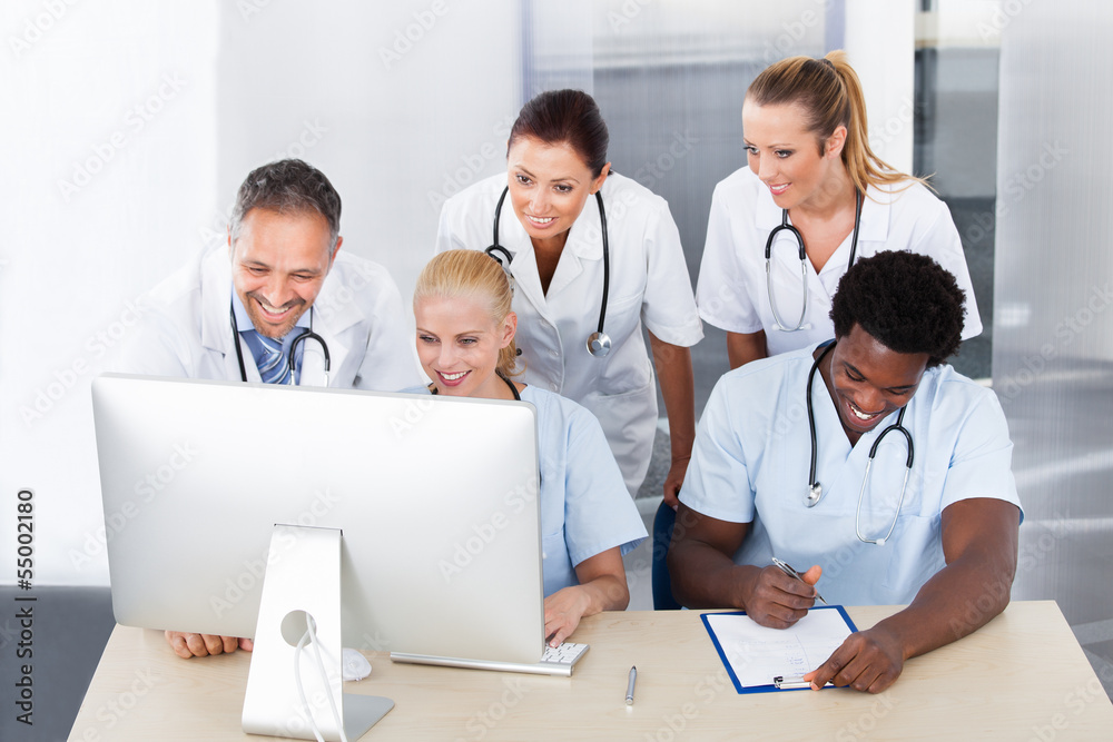 Group Of Doctors Working Together