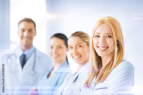 female doctor in front of medical group