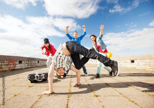 group of teenagers dancing