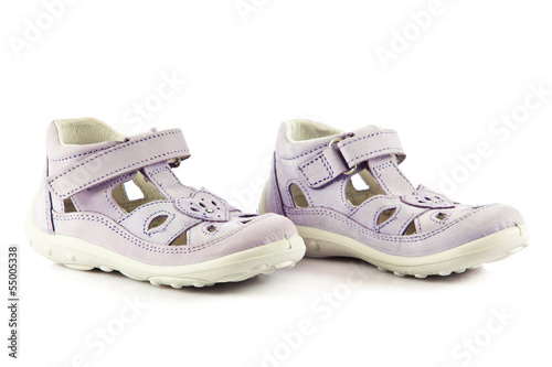 purple sandals for kids. children's shoes isolated on a white ba