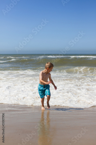 Boy having fun at beach © Mikkel Bigandt