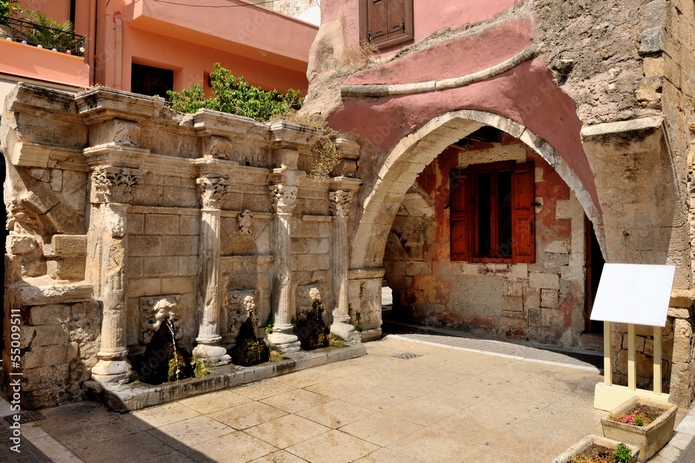 Old venetian fountain in city of Rethymno, Crete, Greece