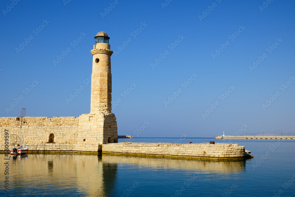 Old venetian lighthouse in city of Rethymno, Crete, Greece